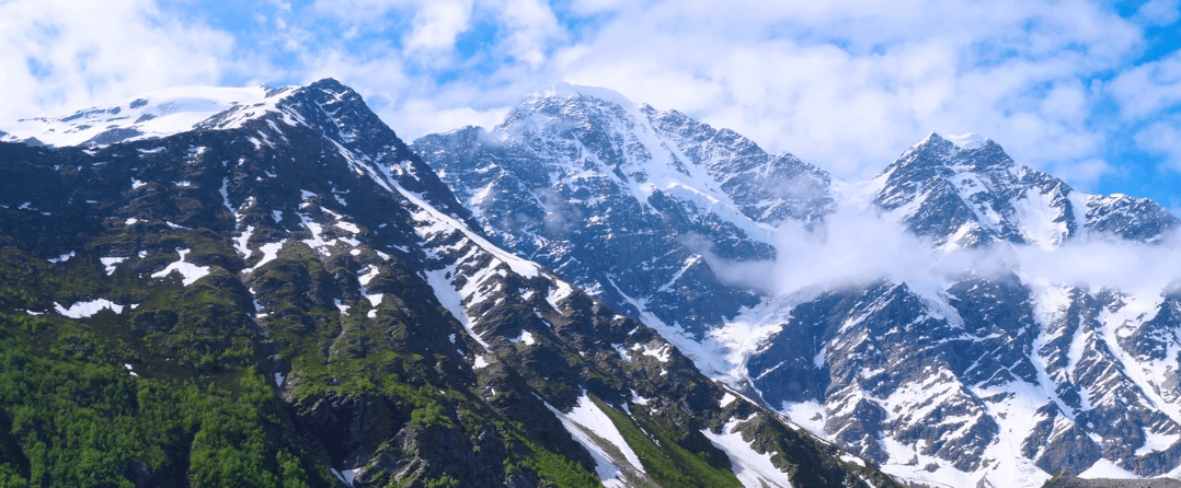 Above the Clouds: Why the Indian Himalayas is the Ultimate "Cool-Cation" of 2026